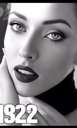 a woman with dark makeup and black stockings poses for a magazine cover