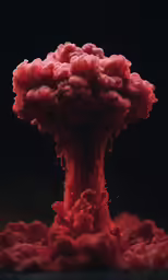 red liquid is pouring out of the top of a plant
