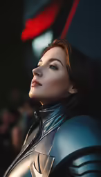 a female in a dark outfit staring ahead