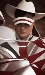 a model wears cowboy hats and silver dress and white gloves