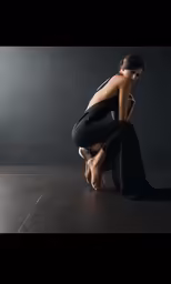a woman with her feet in the air kneeling down