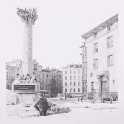 there is a man that is sitting in the snow