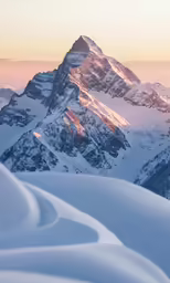 there are many snow covered mountains and valleys in the mountain