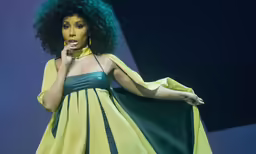 an artistic fashion show with green, yellow and black