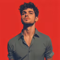 a young man in grey shirt looking sideways