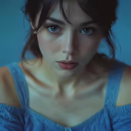 an image of an asian female staring at the camera