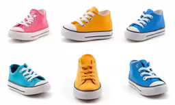 a selection of colorful tennis shoes on a white background