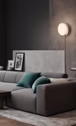 a modern, elegant living room with a corner sofa