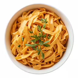 close up of cooked whole pasta with herbs
