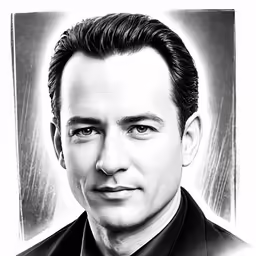 black and white portrait of a man in a suit