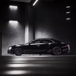 the black car parked in the dark garage