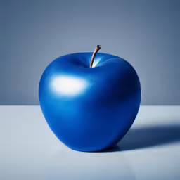 an apple with a blue background and a blue background