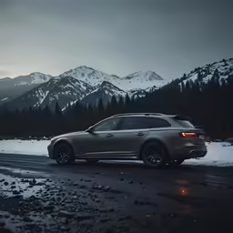 the tail light of an suv with mountains in the background