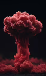 this is a close up photo of red dye on a black background