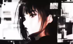 girl looking into camera while wearing black shirt
