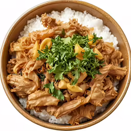 a brown bowl filled with some white rice and food