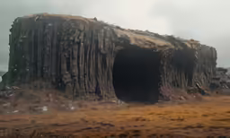 the rock formation is a strange structure that looks like it has been made out of the grass