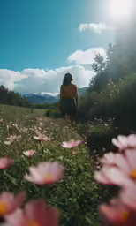 a woman standing in front of pink flowers