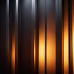 a black background with orange light coming out of the top