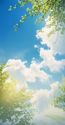 a painting of green leaves and branches against blue sky