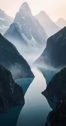 mountains rise above the water in a mountain range