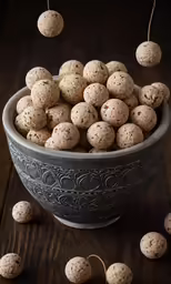 a bowl filled with lots of chocolate candies