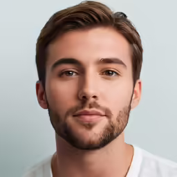 a close up view of the face of a male model