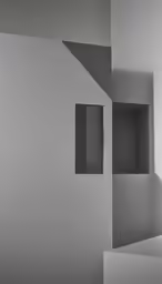 a room with two open doors and an unkempt wall