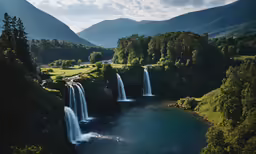 waterfalls with lake surrounded by forest on cloudy day