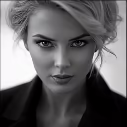 black and white photograph of woman with serious face