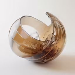 two metal vases on white surface with one empty
