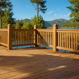 there is a very large wooden deck with mountains in the background