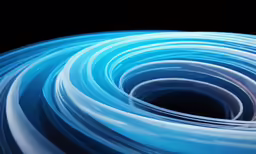 a group of swirls of light that are blue