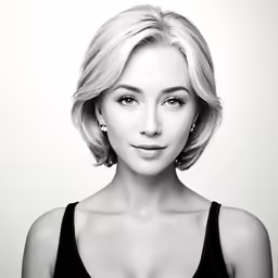 a woman in a black tank top has a dark tank top