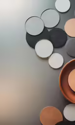 a table with a plate and some coasters on it