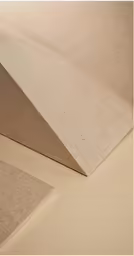 a couple of different colored shapes made from concrete