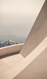 the walls and walkway have geometric shapes near water