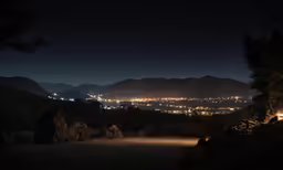 a view from above the hill at night