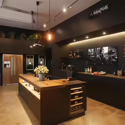 a big kitchen with a big island counter