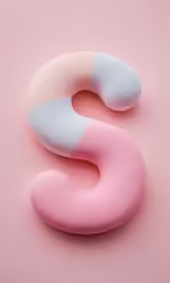 pink and white object laying on pink surface