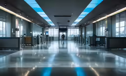 empty public lobby with electronic counters in the center
