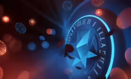 an illuminated circular star with red, white, and blue lights