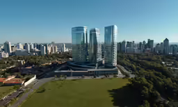 the top of a city that has tall buildings