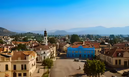 a town with a building on the middle