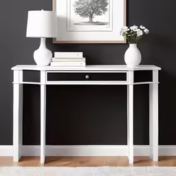 the table has flowers and a lamp on top