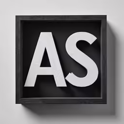 a square shape sign with the letter as in white on a black background