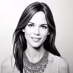 a woman wearing a large necklace and a necklace