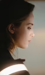 a woman that is staring at something