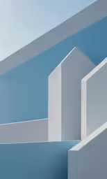 a painting of three columns against a blue background