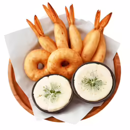 a plate with several onion rings in it